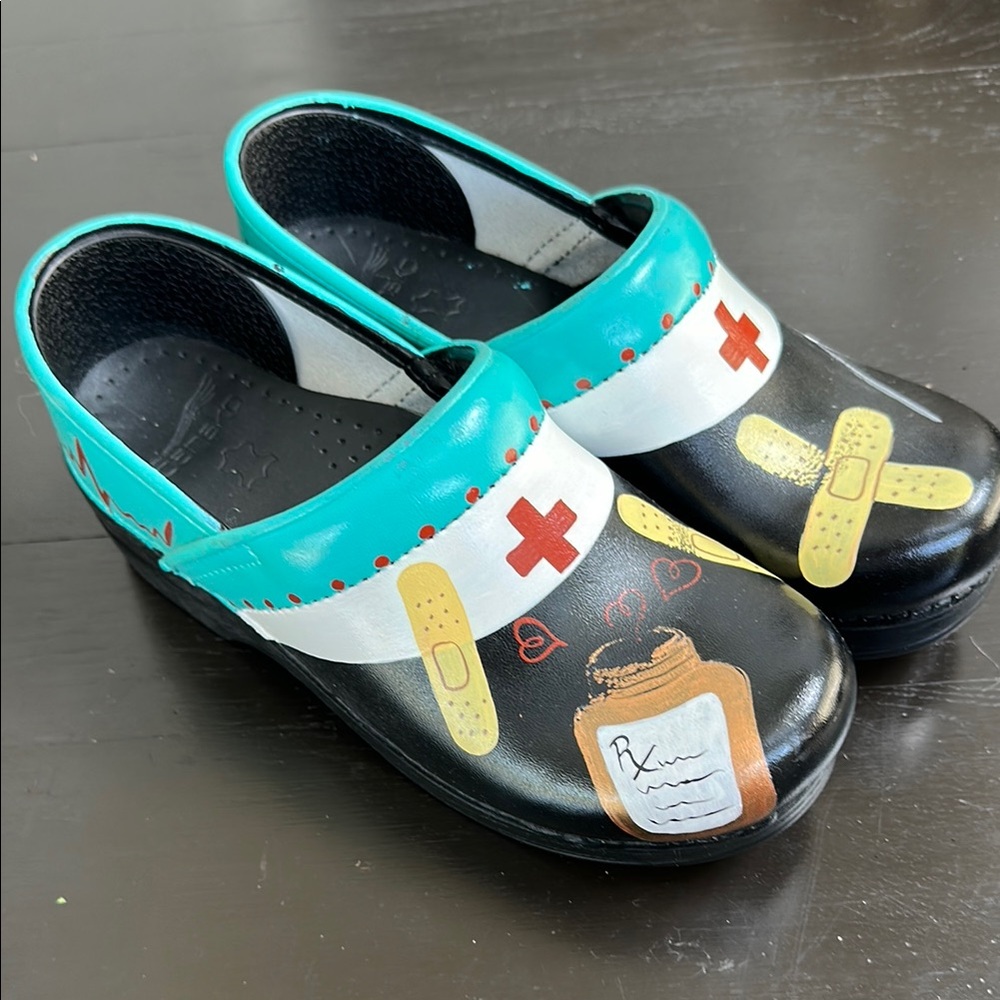 Dansko Black and Blue Mules with Medical-Themed Charms